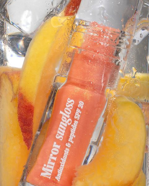 Сонцезахисний блиск для губ Mirror Sungloss Sparkling Bellini SPF 20+ PA++ Hugs 5,5 ml 0209 фото