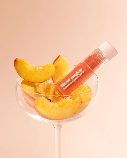 Сонцезахисний блиск для губ Mirror Sungloss Sparkling Bellini SPF 20+ PA++ Hugs 5,5 ml 0209 фото
