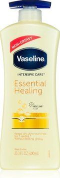 Лосьйон для тіла для зволоження та пружності шкіри Vaseline Intensive Care Essential Healing Body Lotion 600 ml 8901030841095 фото